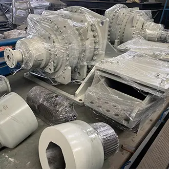 Industrial shredder machine components prepared for international shipping
